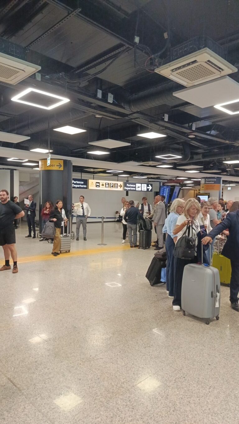Fiumicino arrivals hall: no taxi queue, your driver is already there