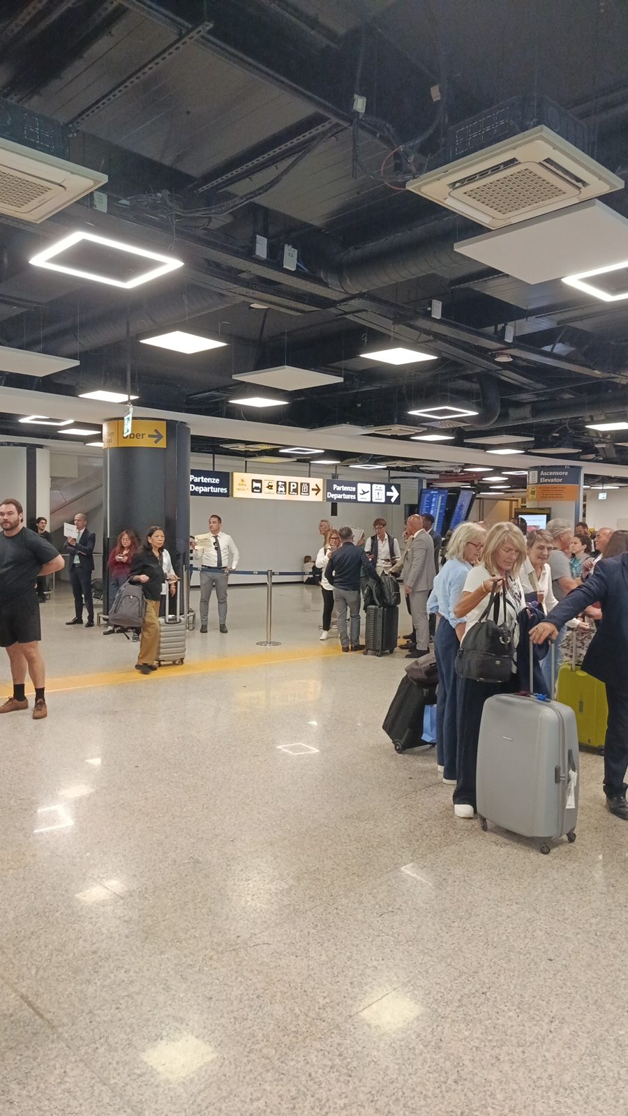 Fiumicino arrivals hall: no taxi queue, your driver is already there